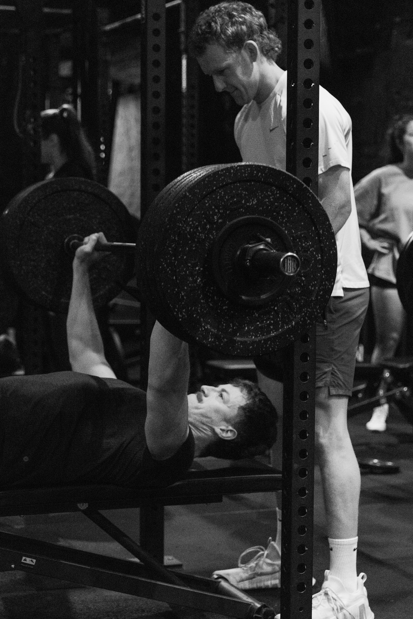 Barbell training with spotter